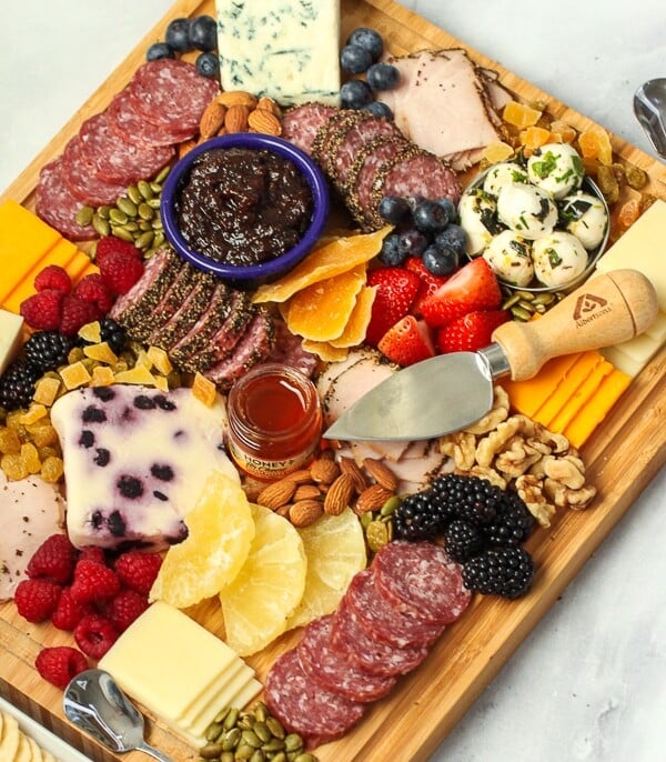 Charcuterie board with meat and cheese.