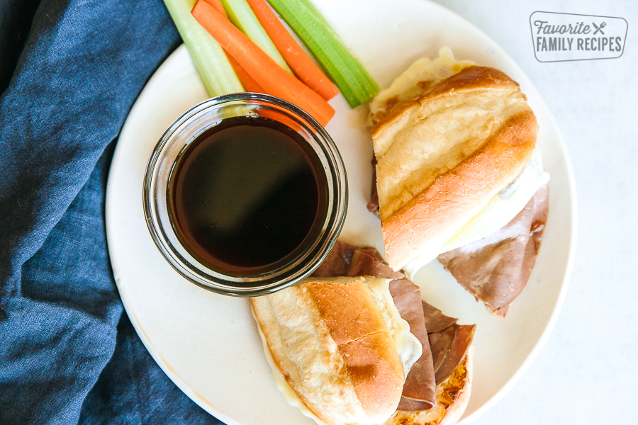 An aerial view of French dip sandwiches with au jus