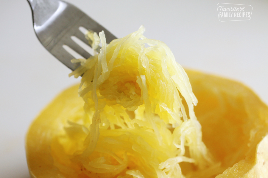 cooked spaghetti squash on a fork