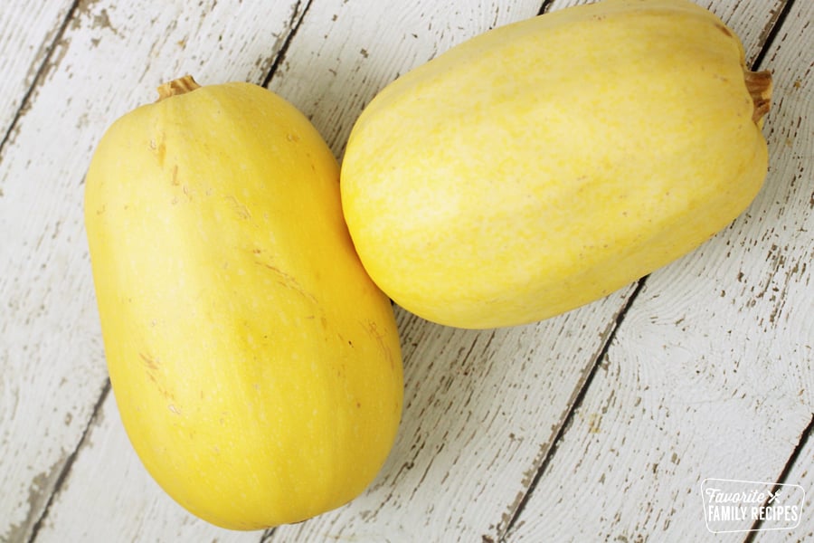 uncooked spaghetti squash on a table