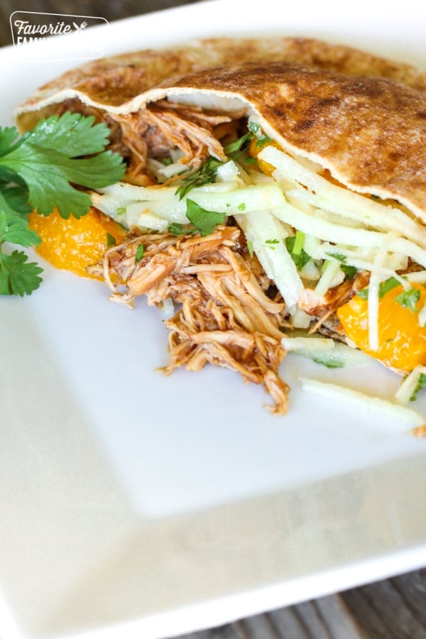 A BBQ Chicken Pita on a white square plate