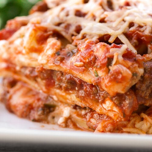 A slice of the best lasagna layered with cheese, meat, and lasagna noodles