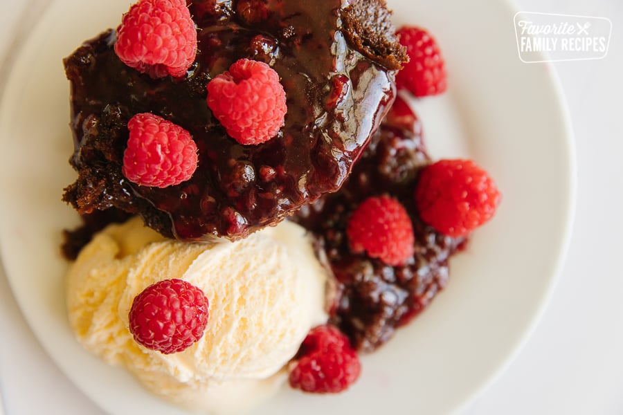 Chocolate Raspberry Cake and a plate with ice cream and fresh raspberries.