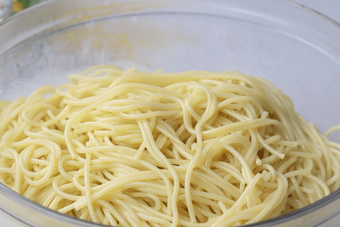Pasta tossed with butter for The Old Spaghetti Factory's Mizithra Pasta.