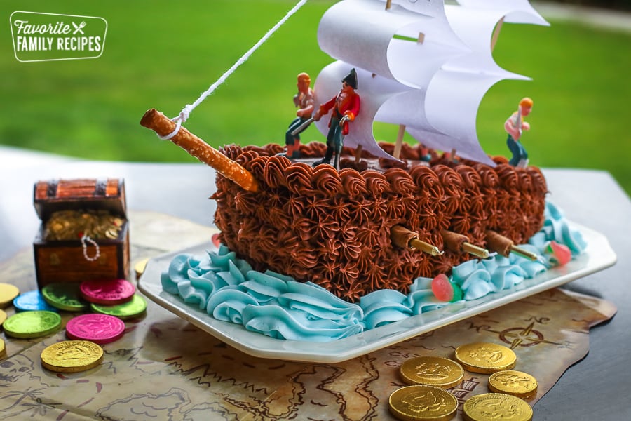 Pirate Ship Cake on a table at a birthday party.