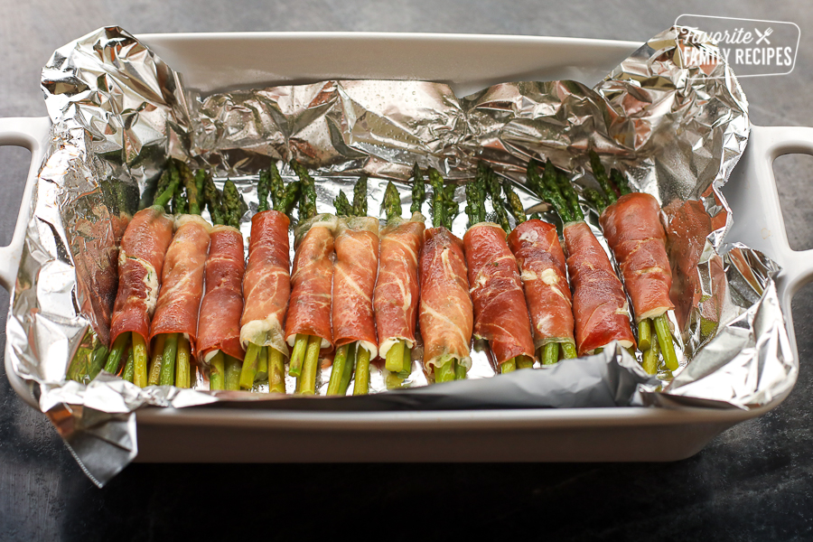 Prosciutto wrapped asparagus in a pan