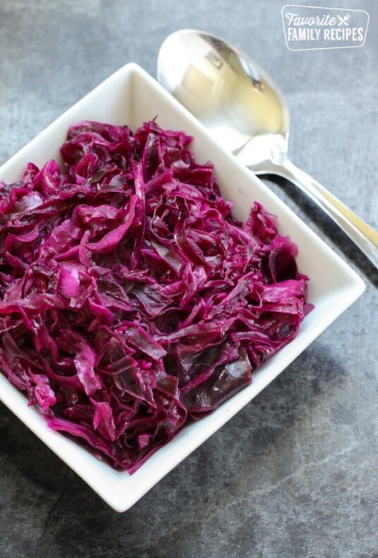 Danish Red Cabbage or Rodkal (Rdkal) served in a white square bowl with a spoon to the side