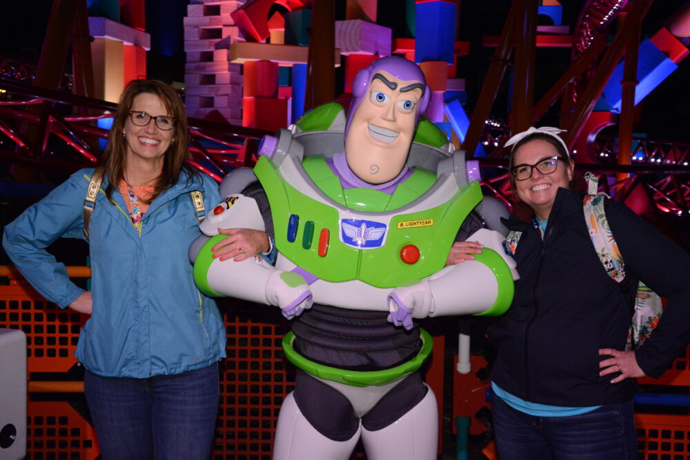 Echo and Emily with Buzz Lightyear in Toy Story Land Hollywood Studios