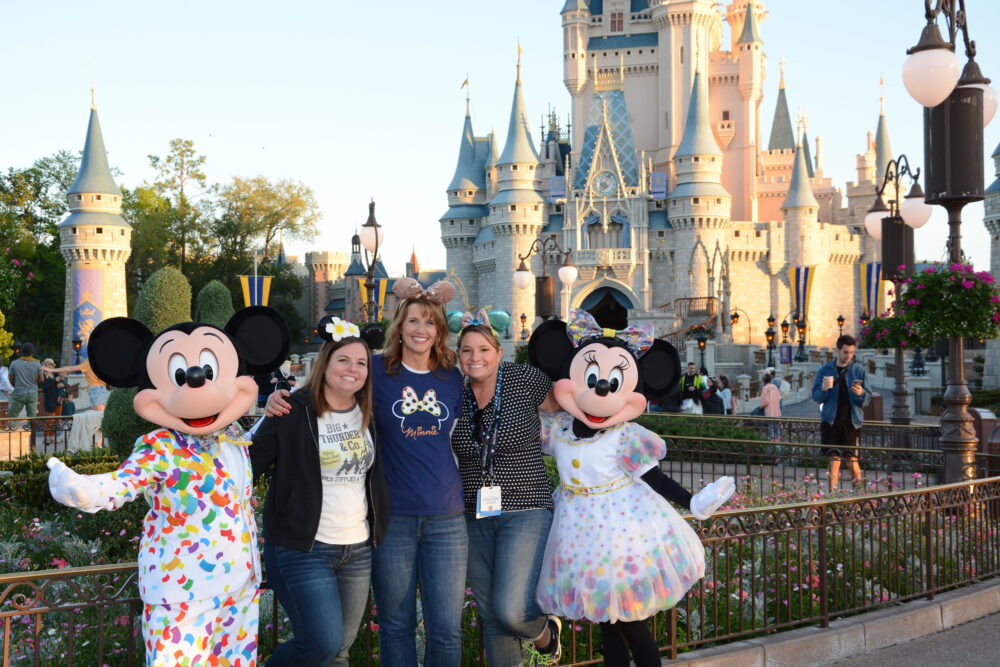 Emily Echo and Emily with Mickey and Minnie in Magic Kingdom Walt Disney World.