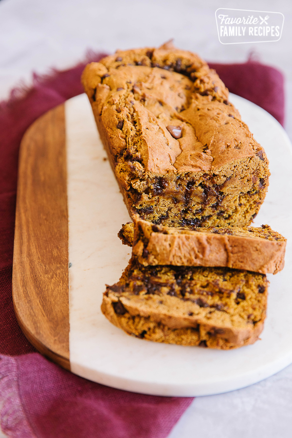 Gluten Free Pumpkin Bread with Chocolate Chips sliced on a cutting board