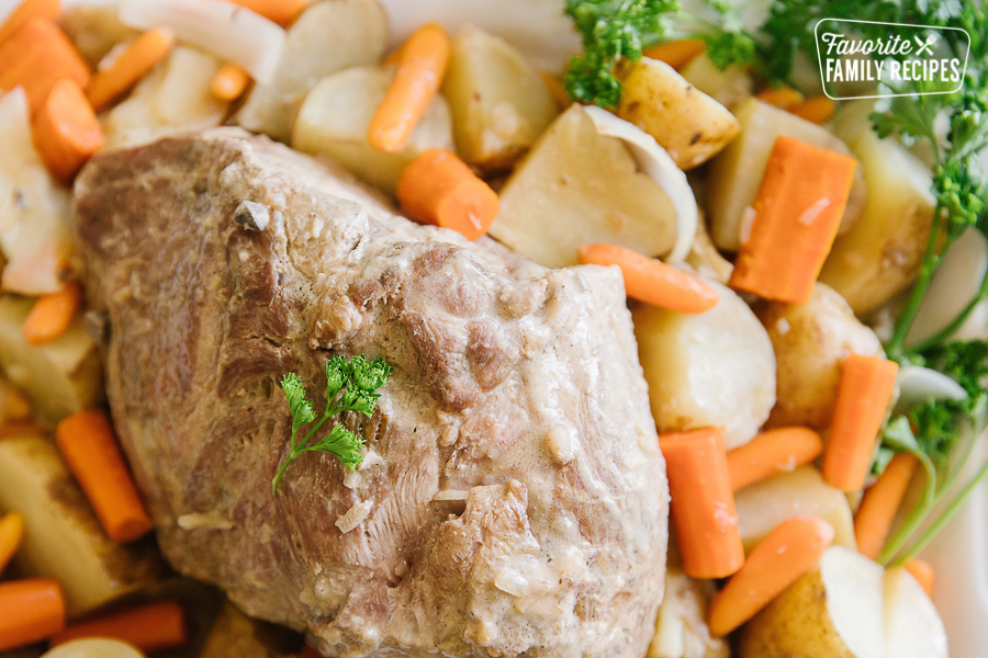Crock Pot Pork Roast with Roasted Potatoes and Carrots on the side.