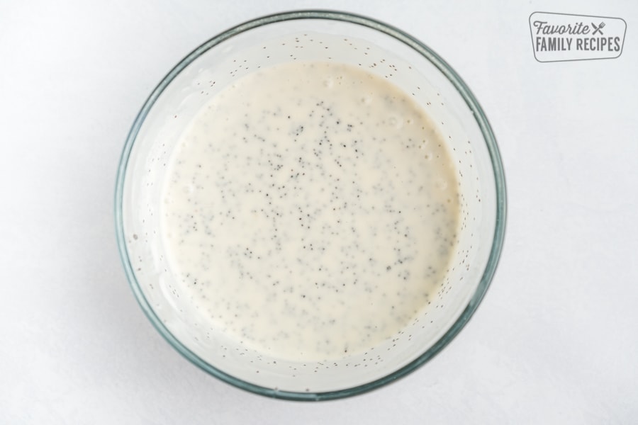 Poppyseed dressing in a small bowl
