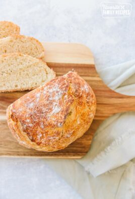 Dutch oven bread on a wood cutting board