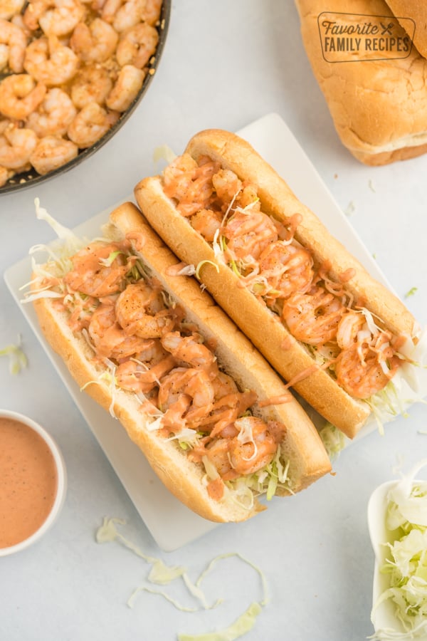 Two shrimp po boys on a plate