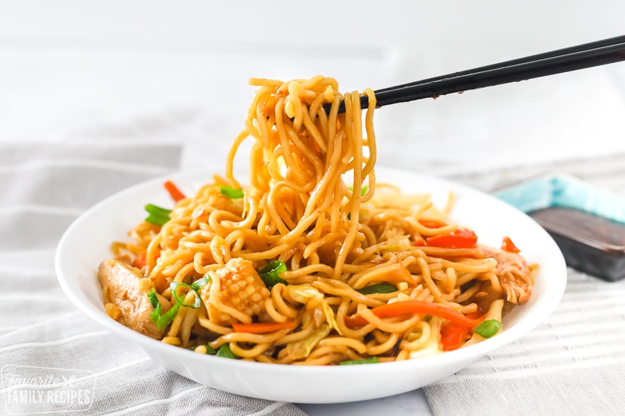 Dish with Yakisoba noodles and chopsticks.