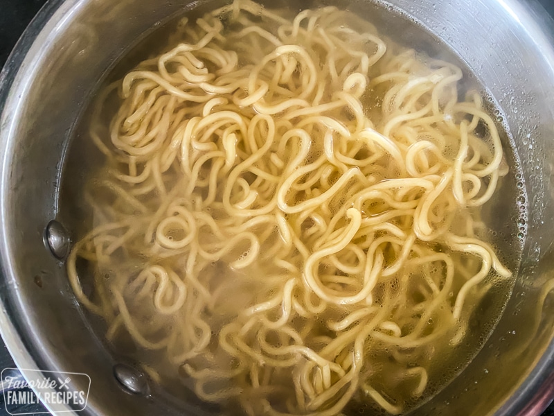 Noodles boiling in water
