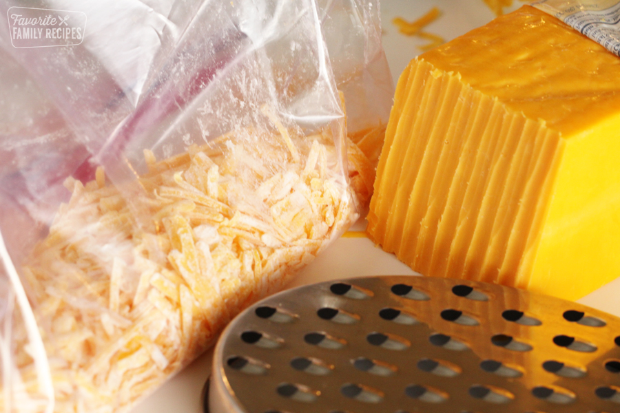 Shredded cheddar cheese for freezing