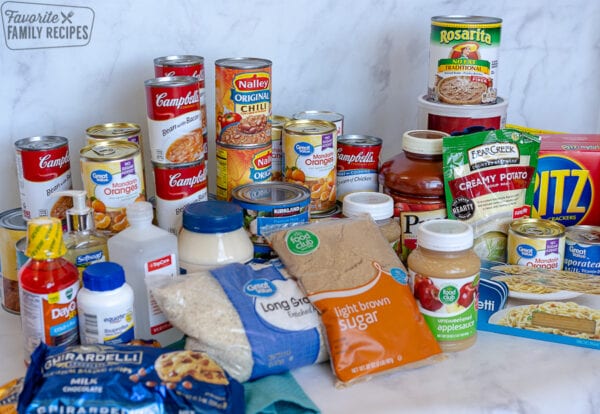 A variety of dry storage for food storage stacked on a table.