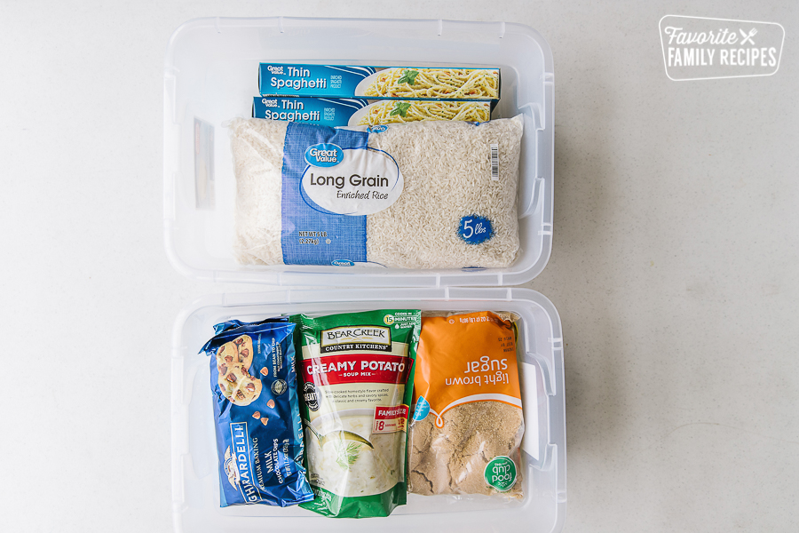 Bags of rice, chocolate chips, soup, and sugar in plastic bins