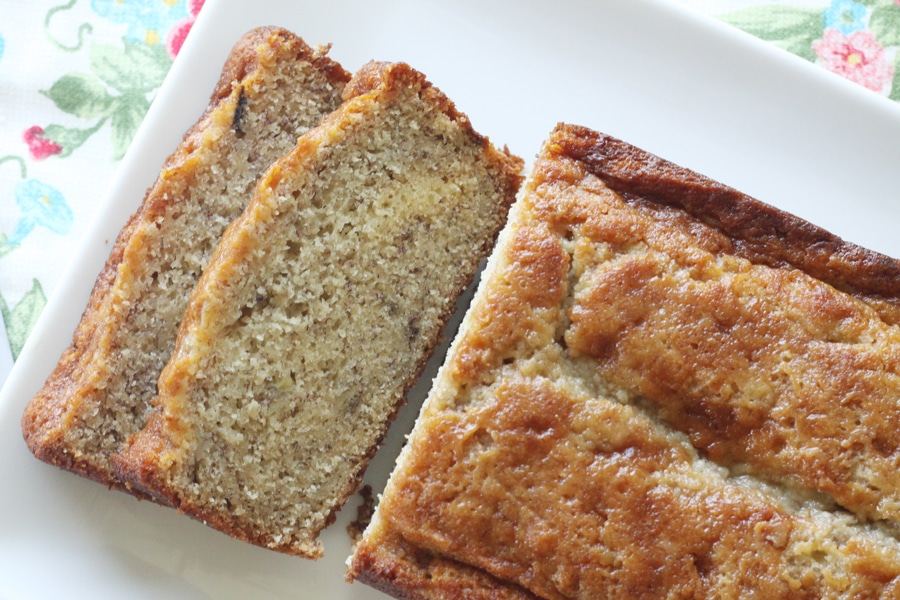 A close up view of two slices of banana bread cut from the end of the loaf.