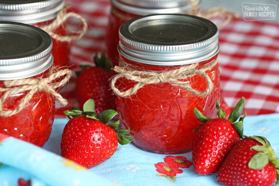 Freezer jam with strawberries in a small jar