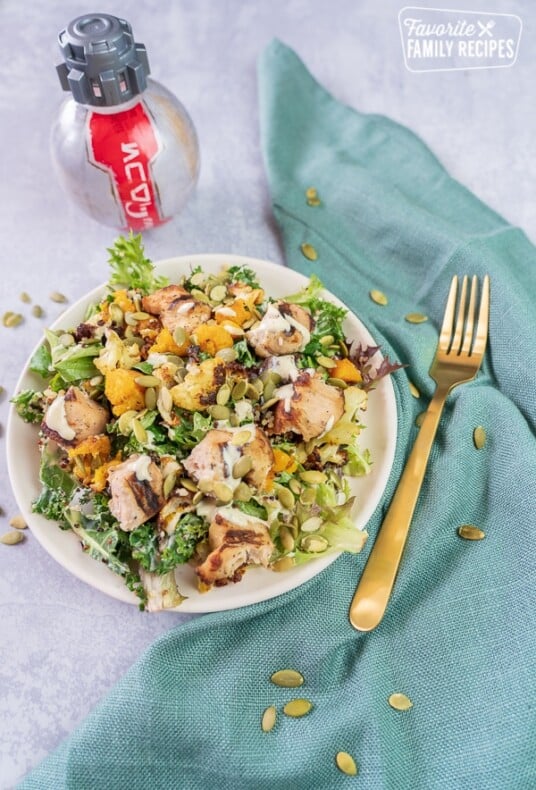 Chicken Salad on a plate with a bottle of diet coke