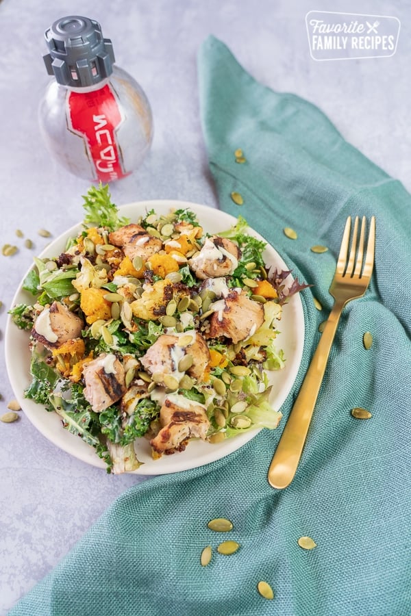 Chicken Salad on a plate with a bottle of diet coke