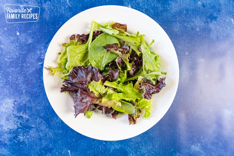 Lettuce on a white bowl. 