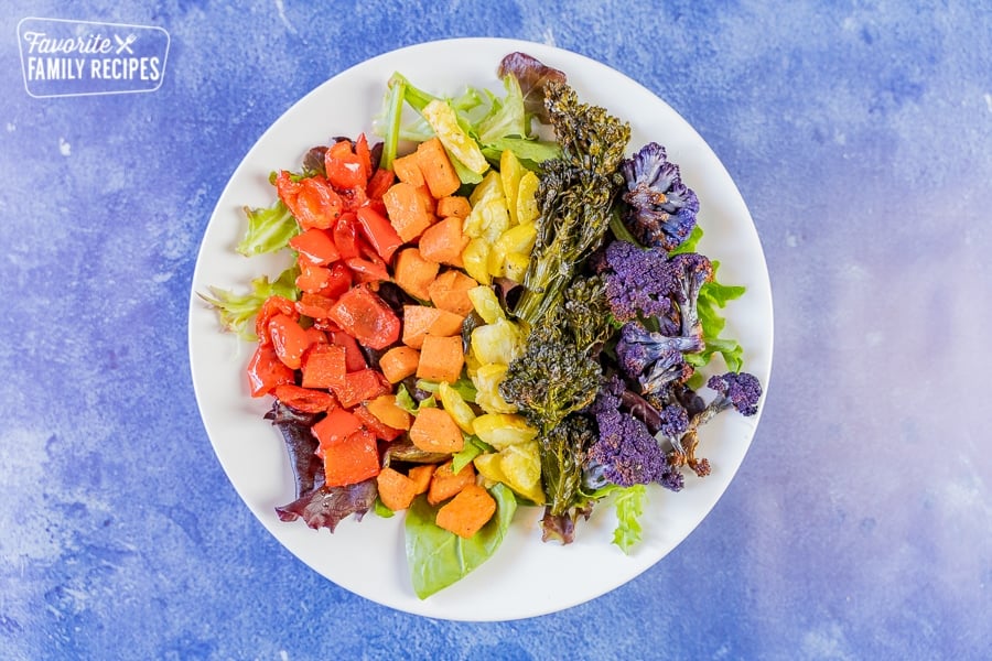 Rainbow buddha bowl with a rainbow of colors.