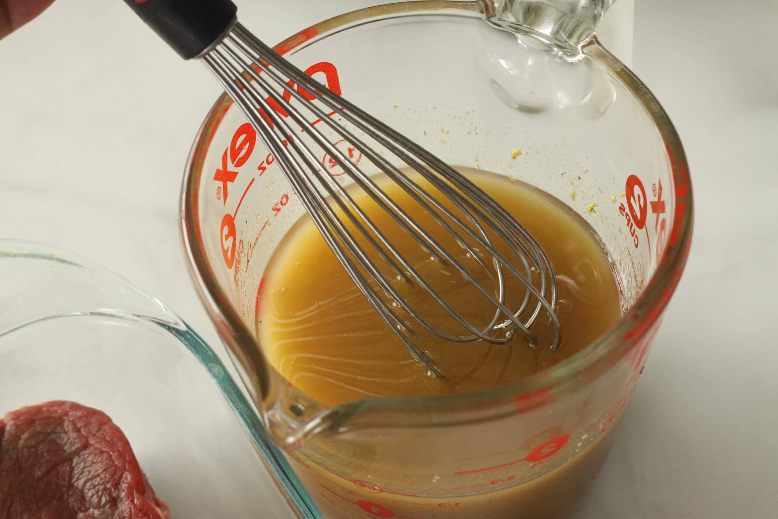 Sauce being mixed to make steak marinade.