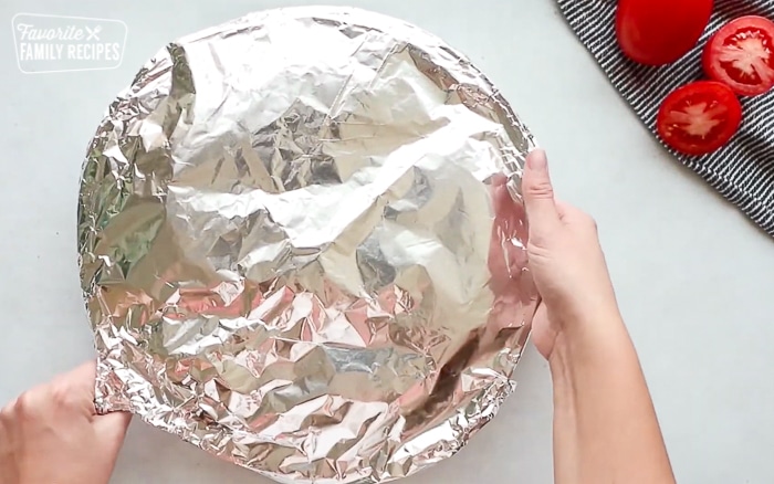 Covering Ratatouille with Foil for baking
