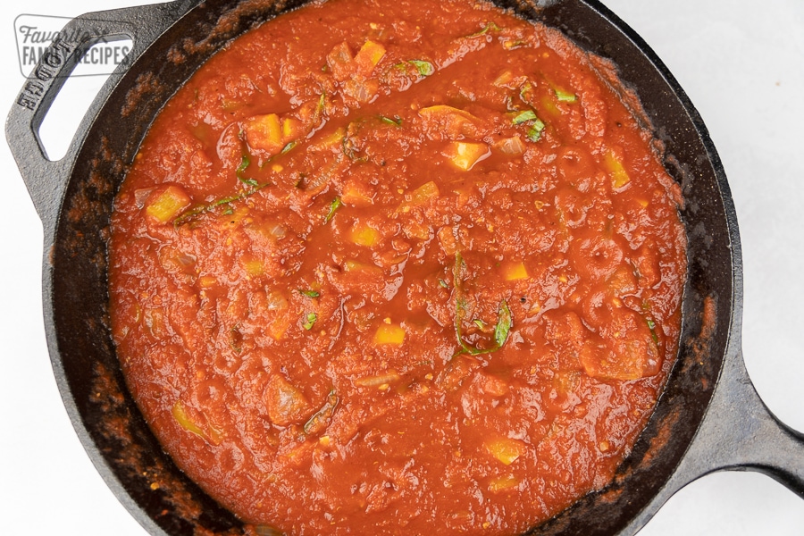 Ratatouille sauce in a cast iron skillet.