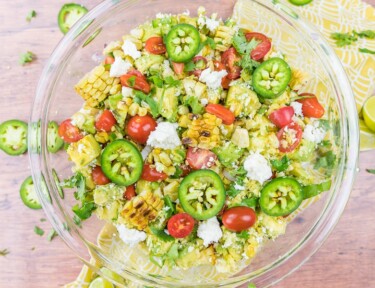 Grilled corn salad in a glass bowl