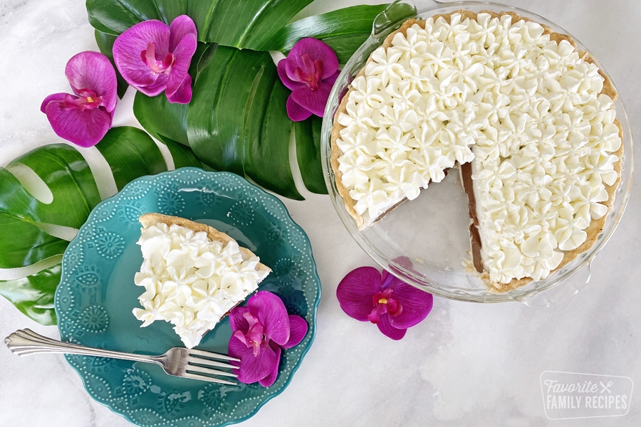 Chocolate haupia pie with a slice on a plate