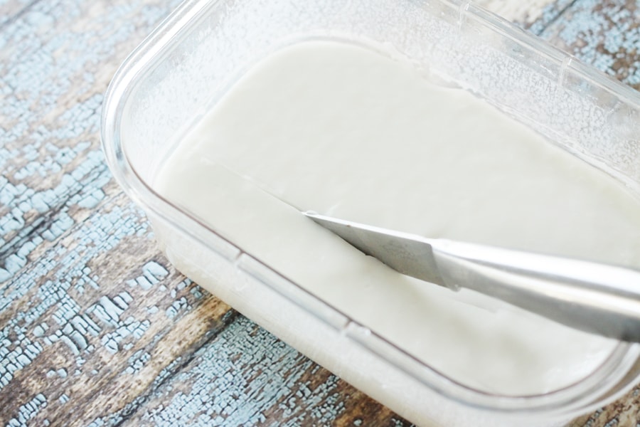 Haupia being sliced with a knife