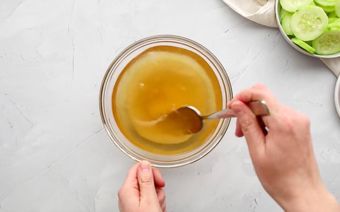 Stirring together marinade ingredients