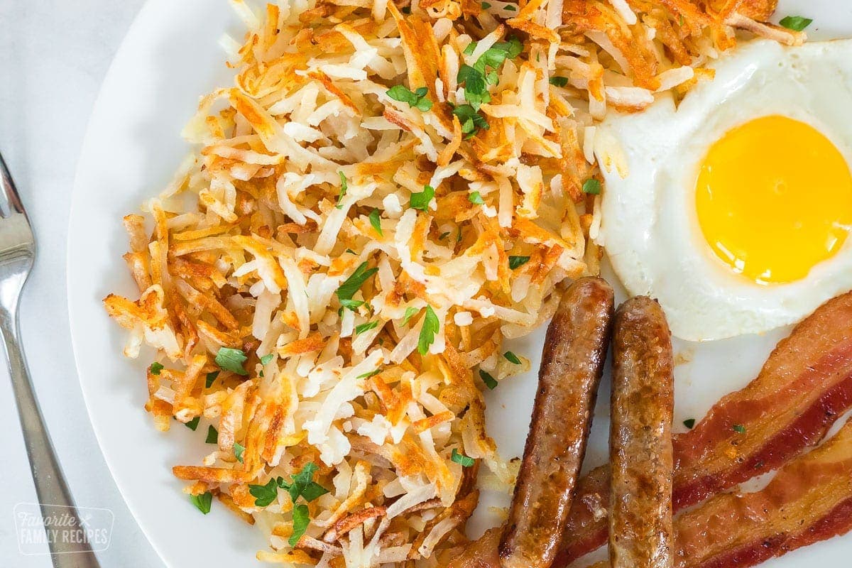 Cooked hash browns garnished with parsley