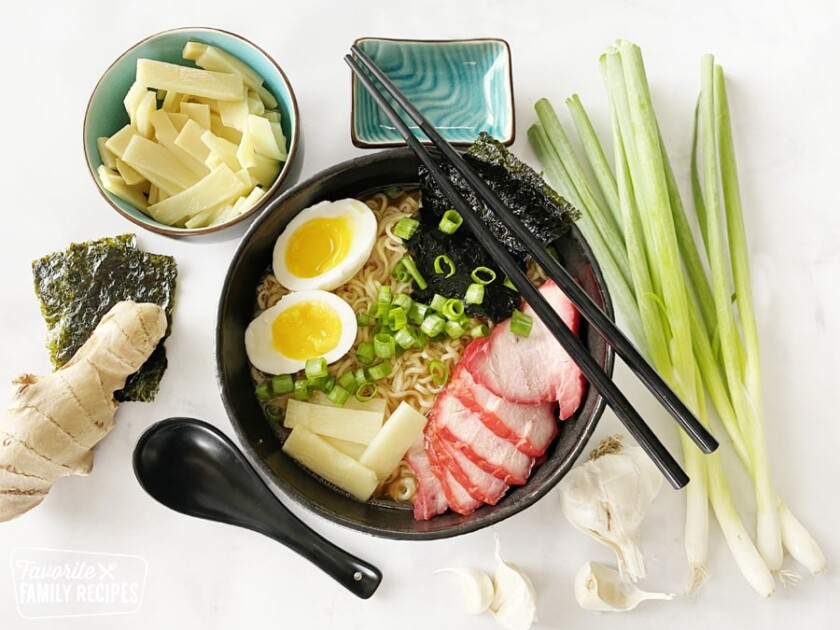 shoyu tamen in a bowl next to ingredients