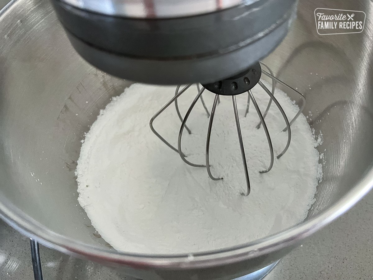 Bath bomb dry ingredients in a large bowl.