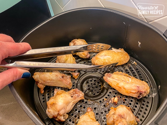Turning wings in air fryer during cooking process