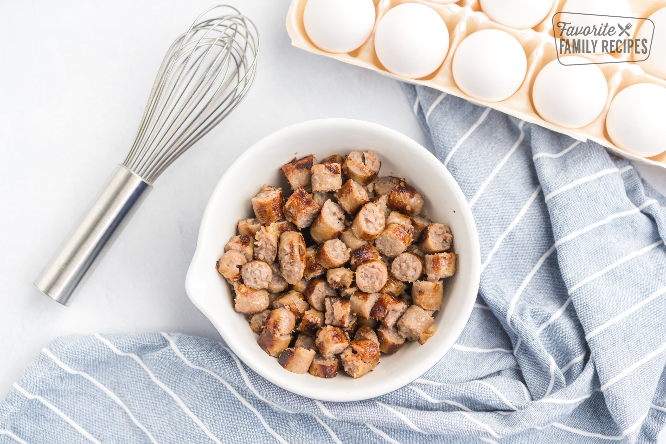 Cooked and diced sausage in a small bowl