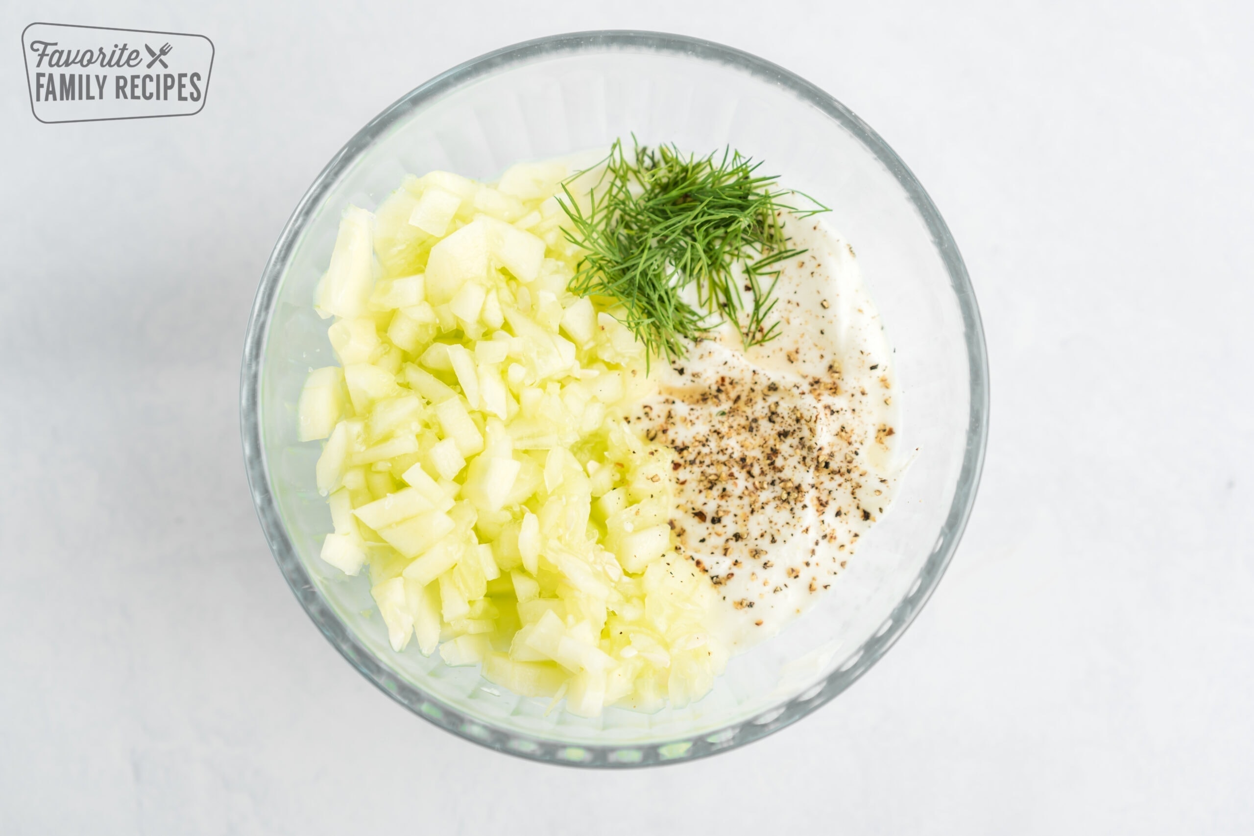 ingredients for tzatziki sauce in a bowl