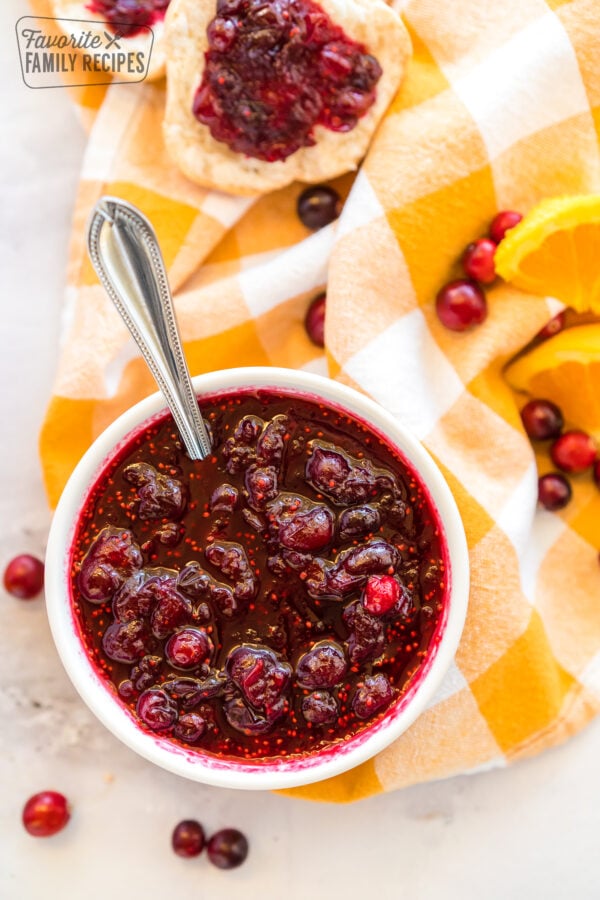 Cranberry Orange sauce with fresh cranberries and oranges on the side