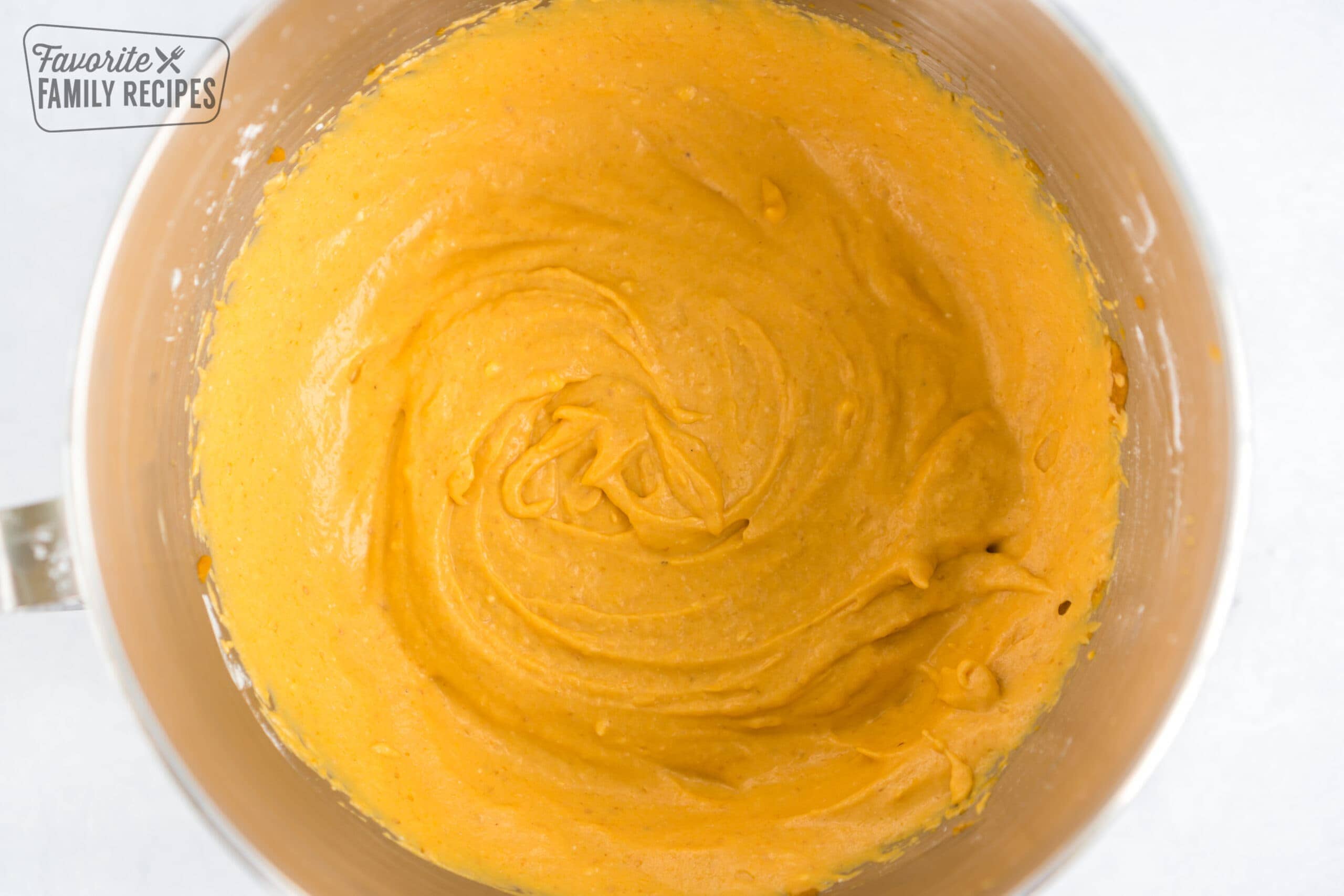 Pumpkin dip in a mixing bowl.