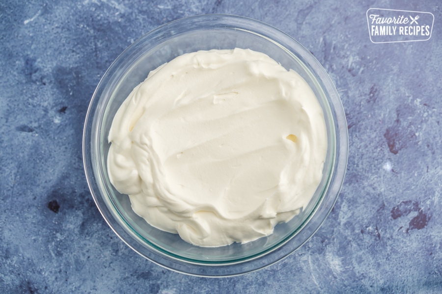 Coconut whipped topping in a glass bowl