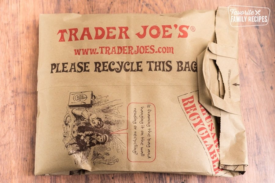 A dutch apple pie inside of a brown paper bag