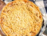 Whole Dutch Apple Pie on a gingham napkin