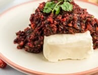 Cranberry salsa on top of a block of cream cheese