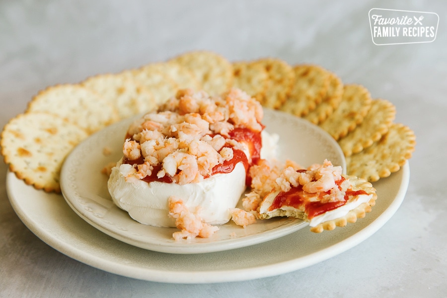 Cream Cheese Shrimp Dip on a platter surrounded by crackers