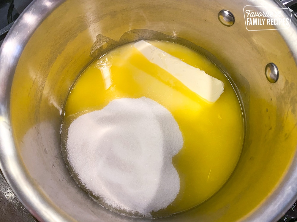 Butter and sugar melting in the saucepan.